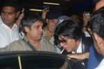 Shahrukh Khan snapped at international airport on 9th Dec 2011 (12).JPG